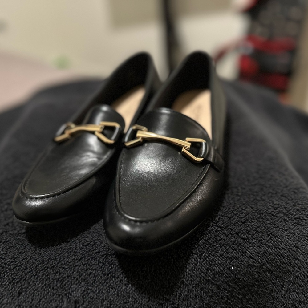Elegant Black Loafers with Gold Accent
